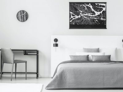 Black poster in bedroom interior