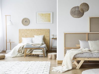 Natural bedroom with wooden bedhead